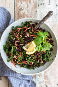 Forbidden rice salad with tumeric and kale is a great post workout high protein vegan meal.