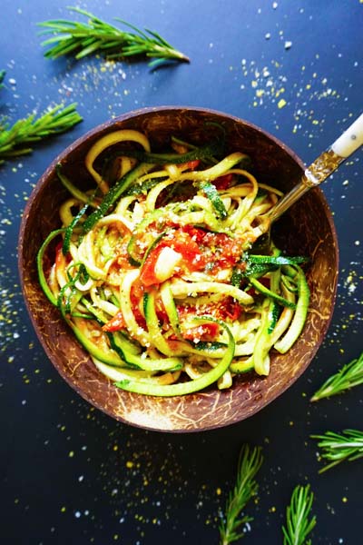 This is vegan zucchini spaghetti with rosemary tomato